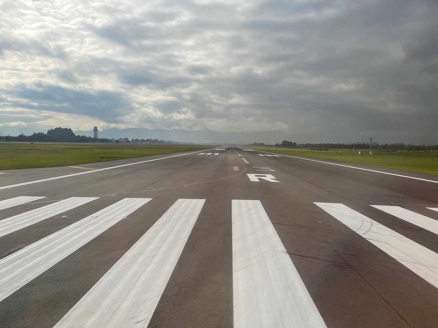 a runway with white lines on it