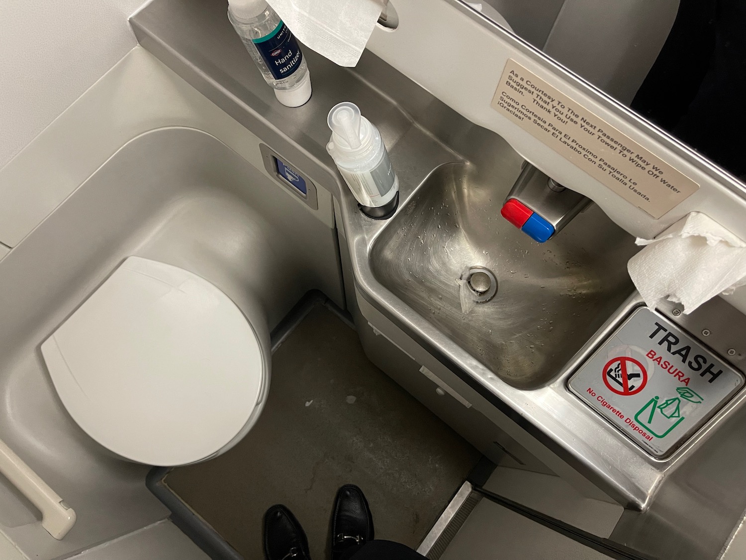 a sink and toilet in a plane