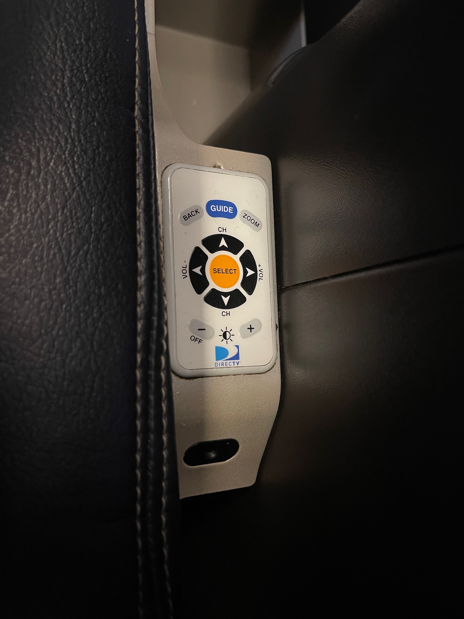 a white and yellow remote control