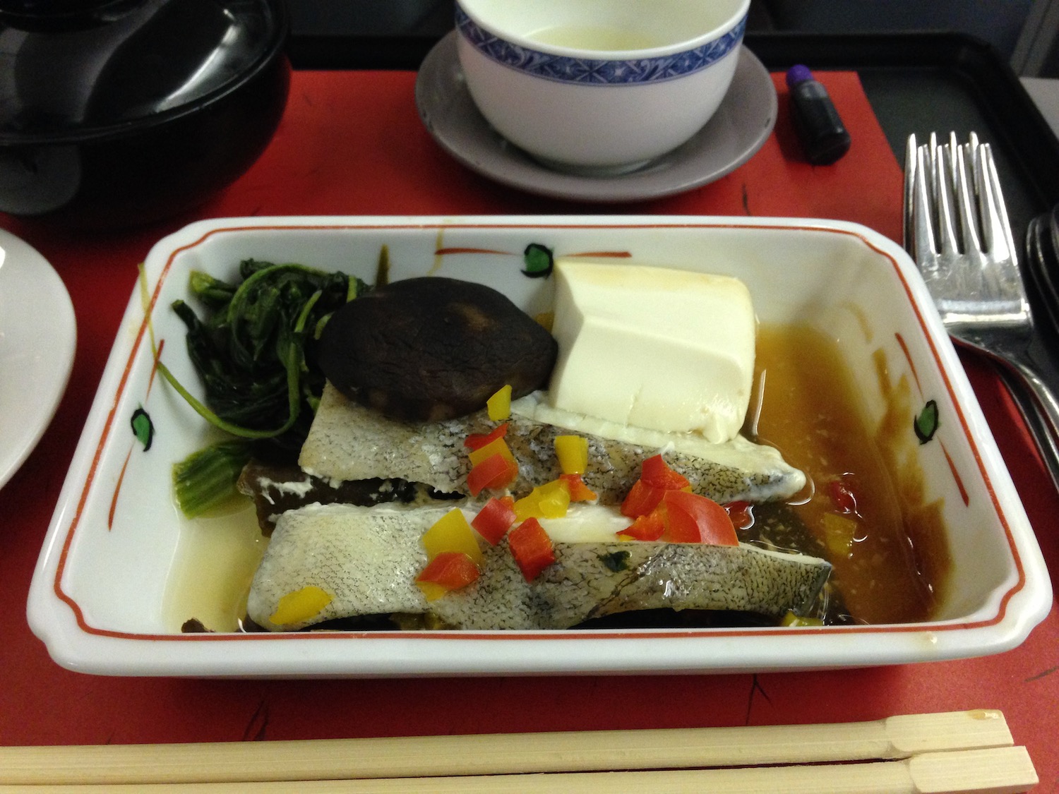 a bowl of food on a tray