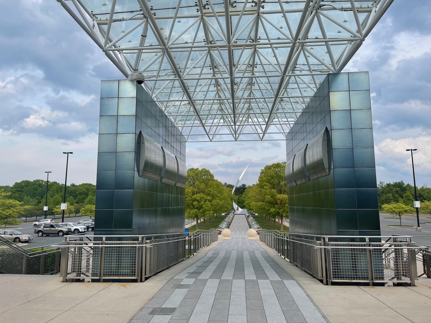 a walkway with a metal structure
