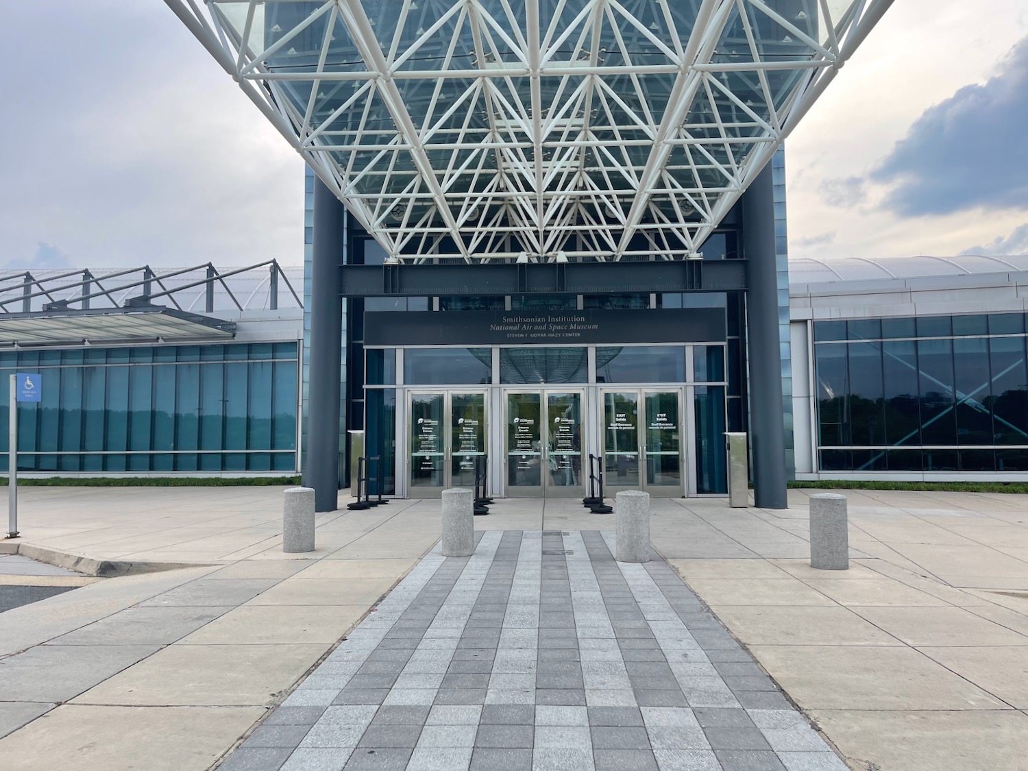 a glass building with a glass roof