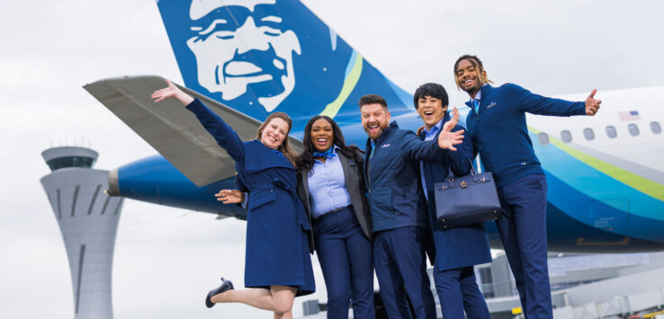 a group of people in front of a plane