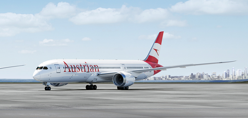 a white and red airplane on a runway