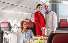 a group of people standing in a plane