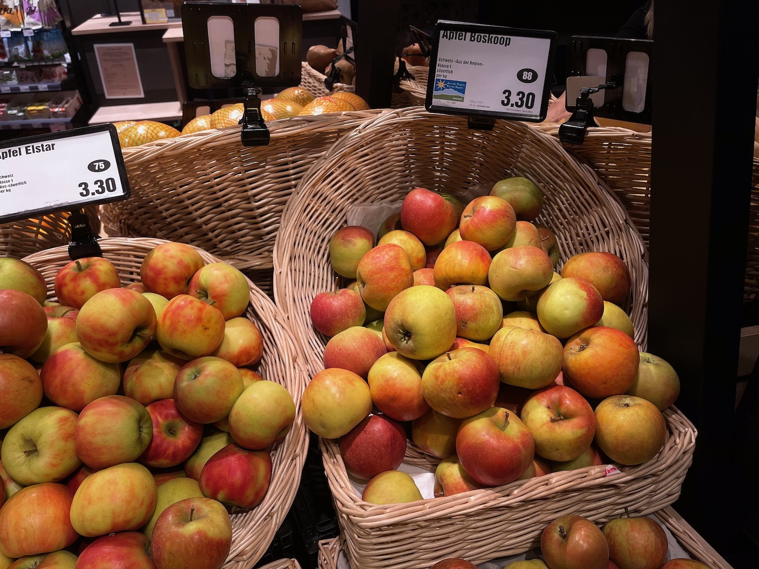 baskets of apples in a store