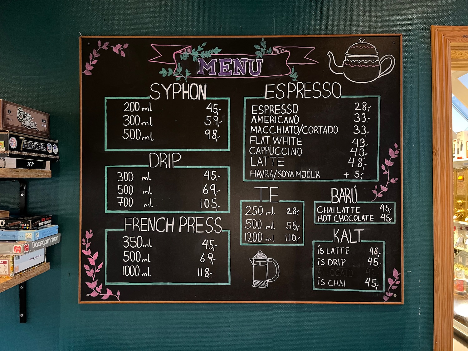 a menu board with writing on it