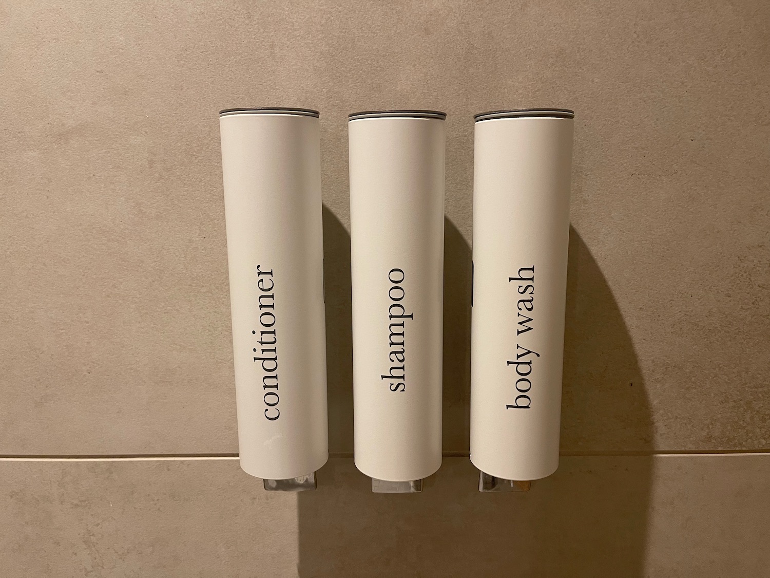 a group of white containers with black text