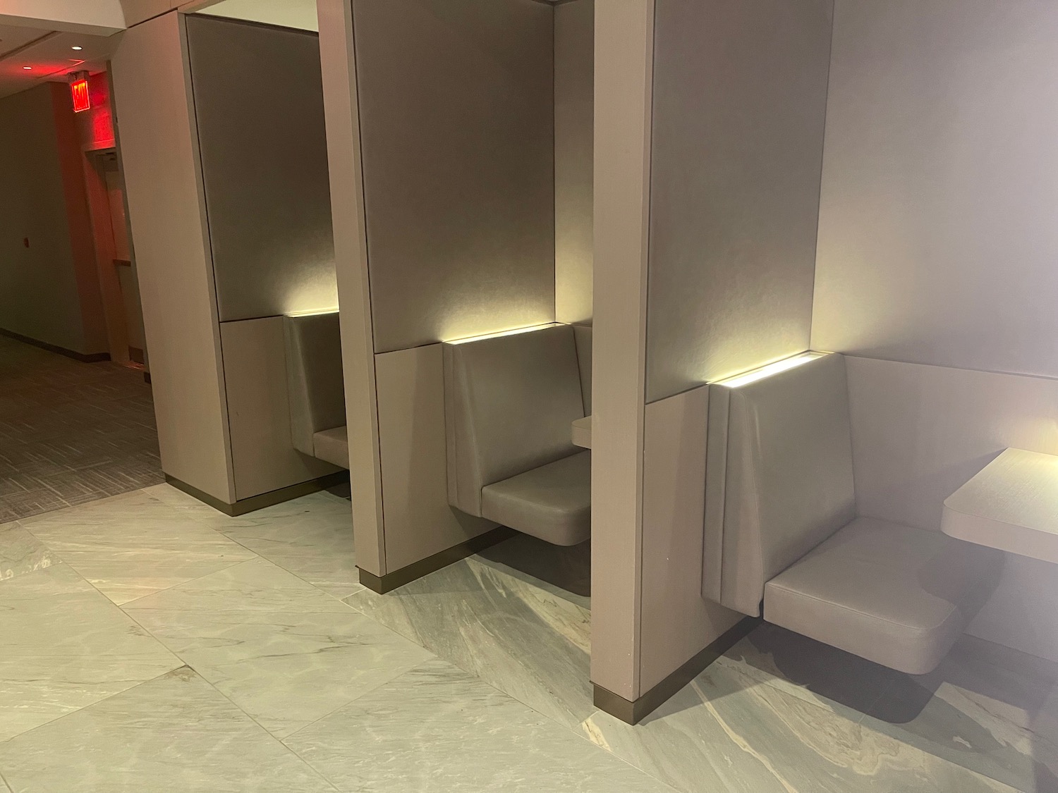 a row of white booth booths