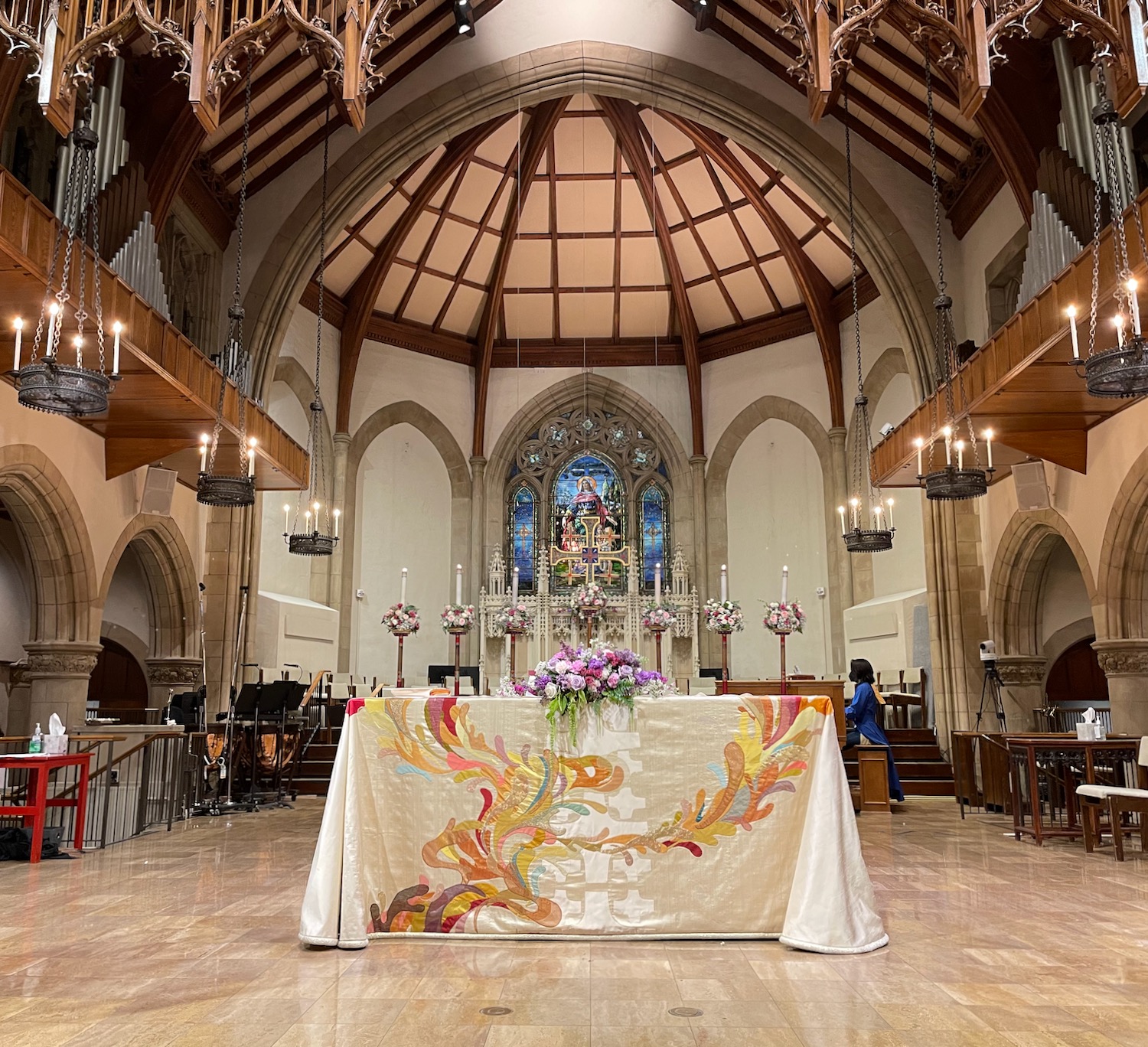 a church with a table covered in flowers