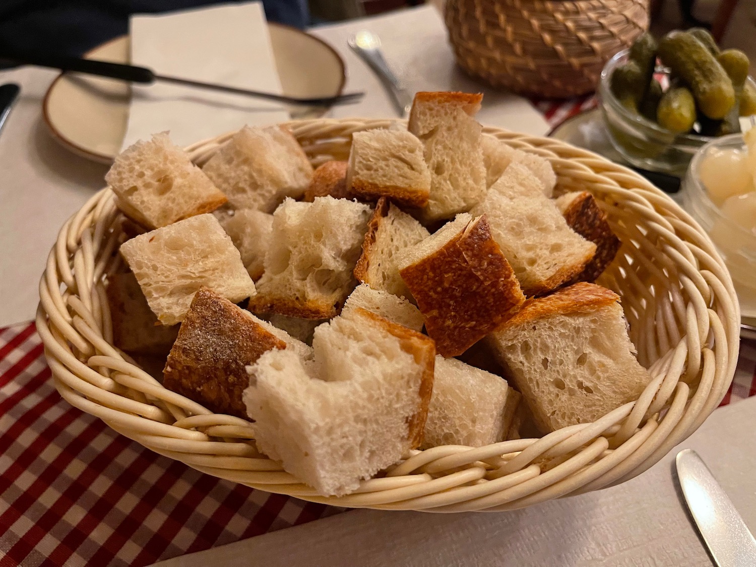 a basket of bread in a table