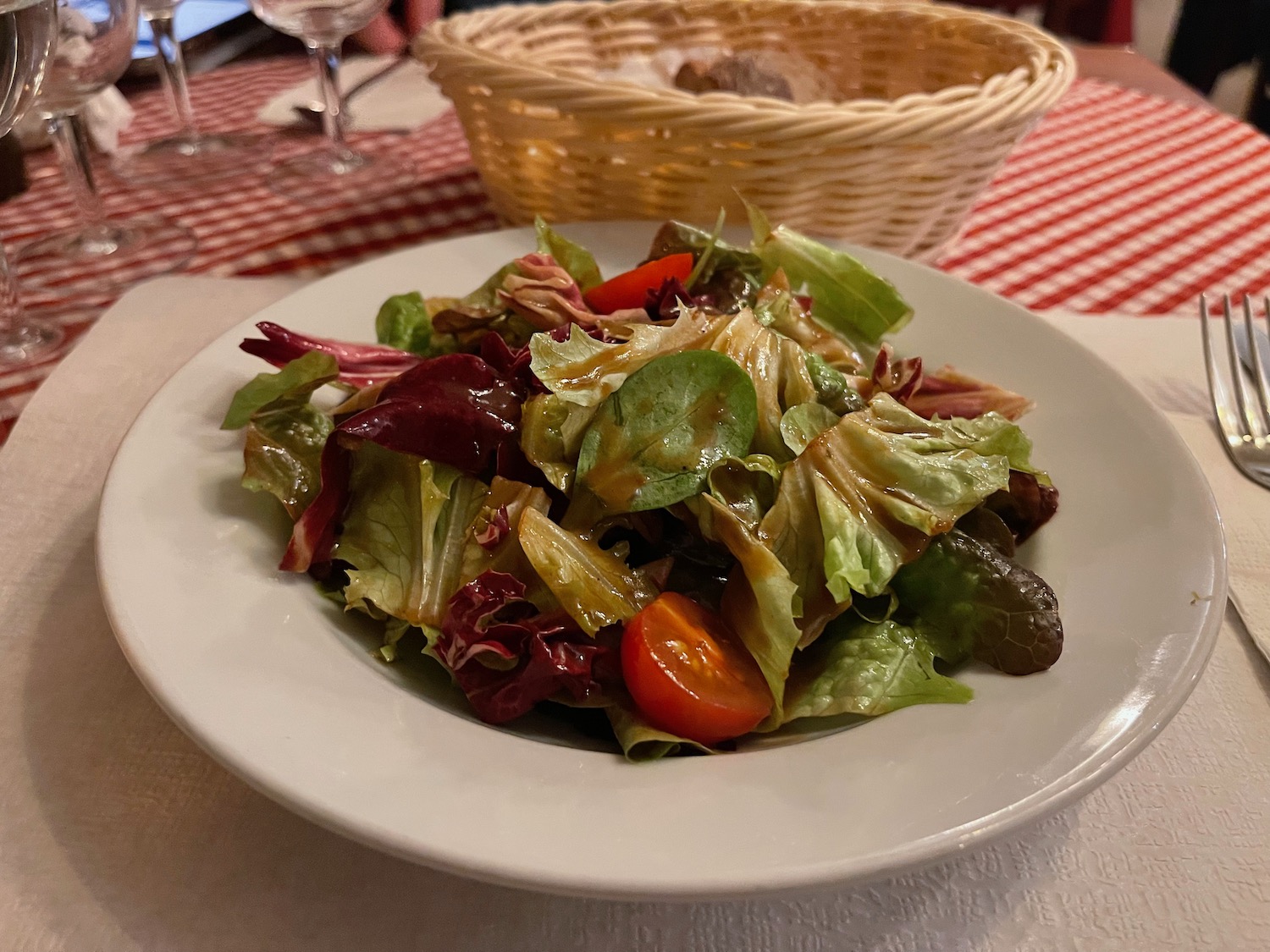 a plate of salad on a table