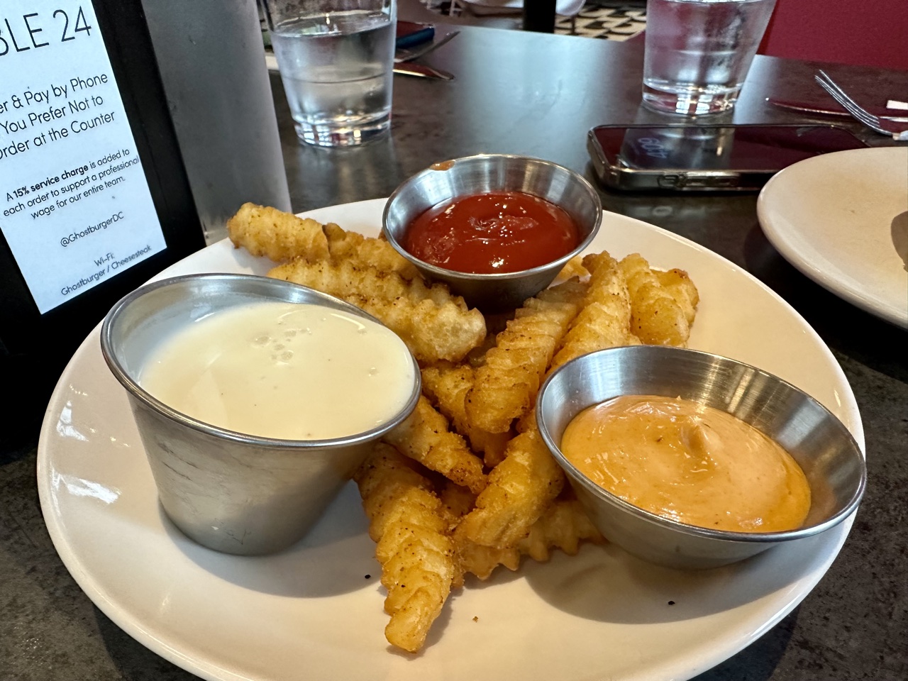 Ghost Burger crinkle cut fries with queso