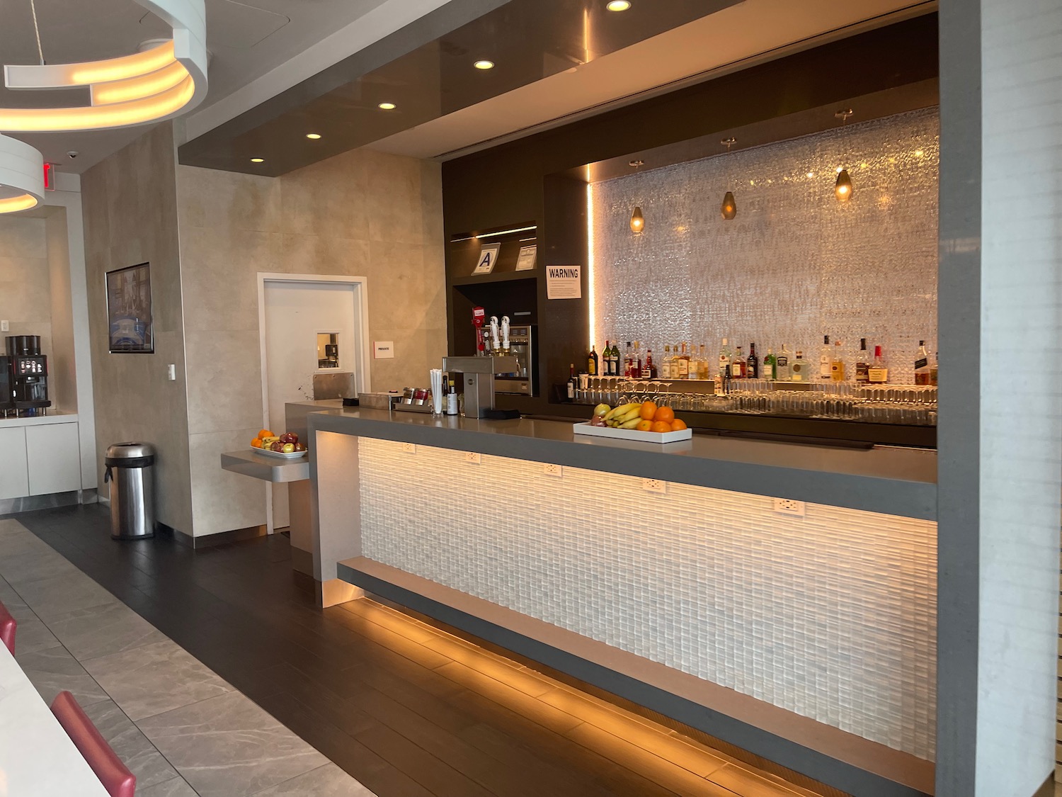 a bar with bottles on the counter