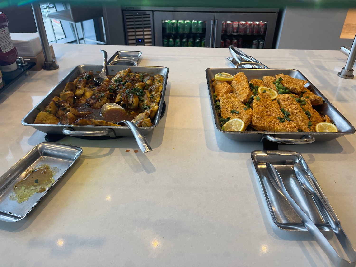 a group of pans of food on a table