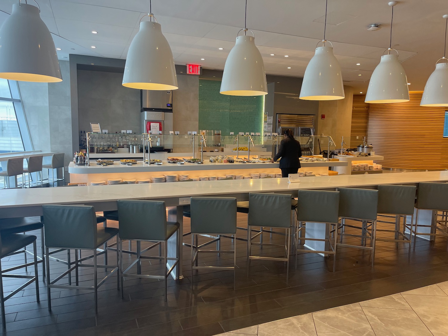 a restaurant with a long table and chairs