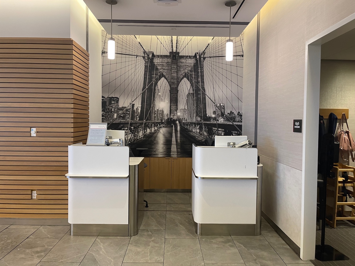 a wall mural of a bridge and a couple of white counter tops