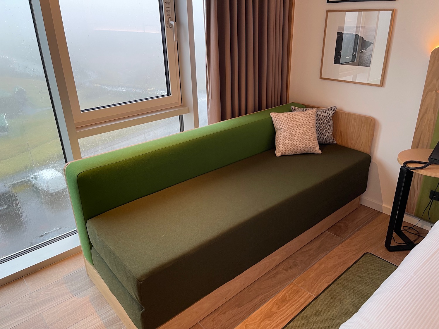 a green couch in a room