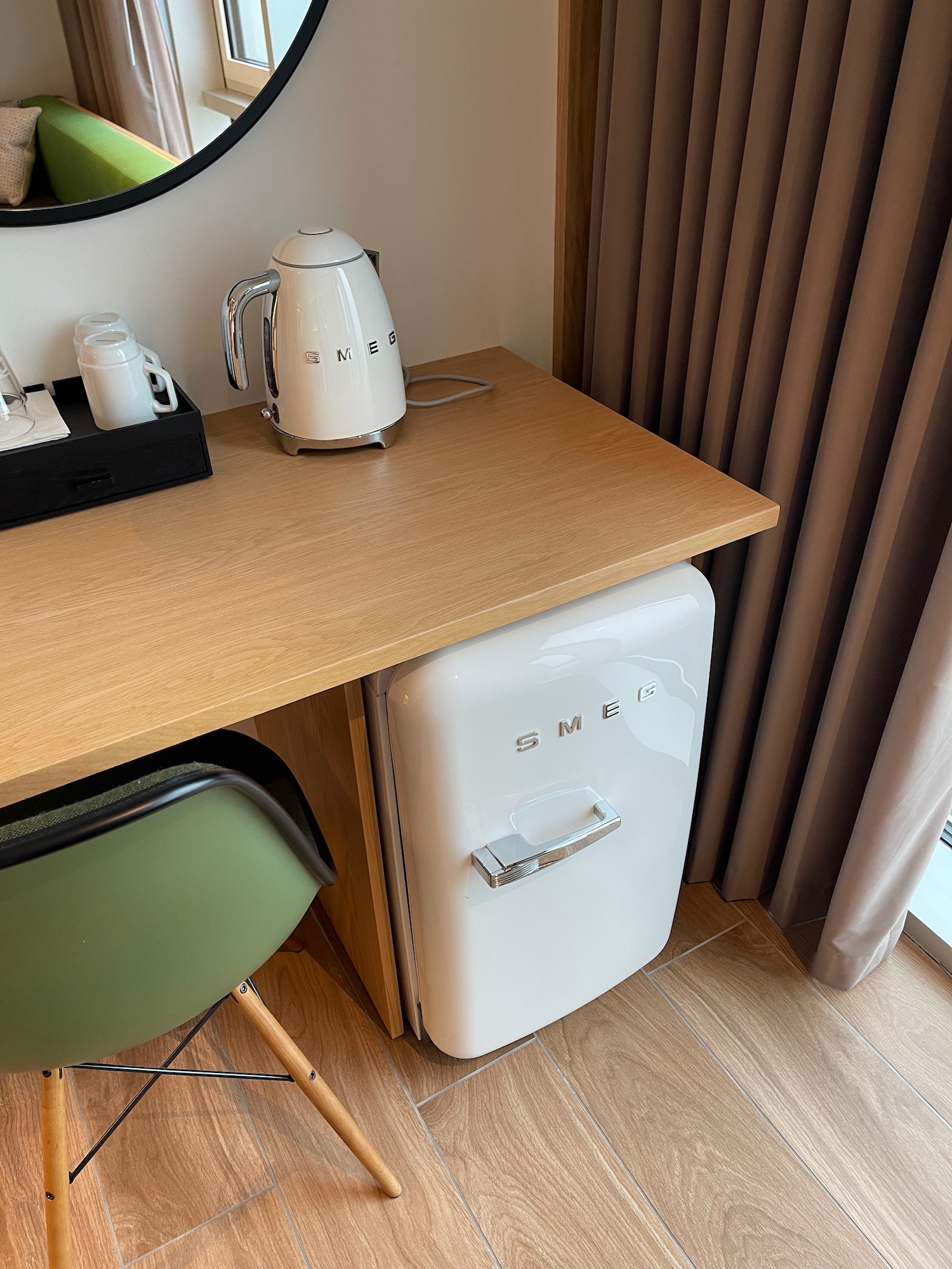 a small refrigerator on a desk