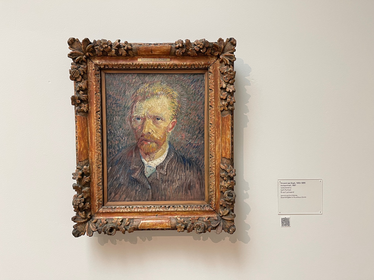 a painting of a man in a frame