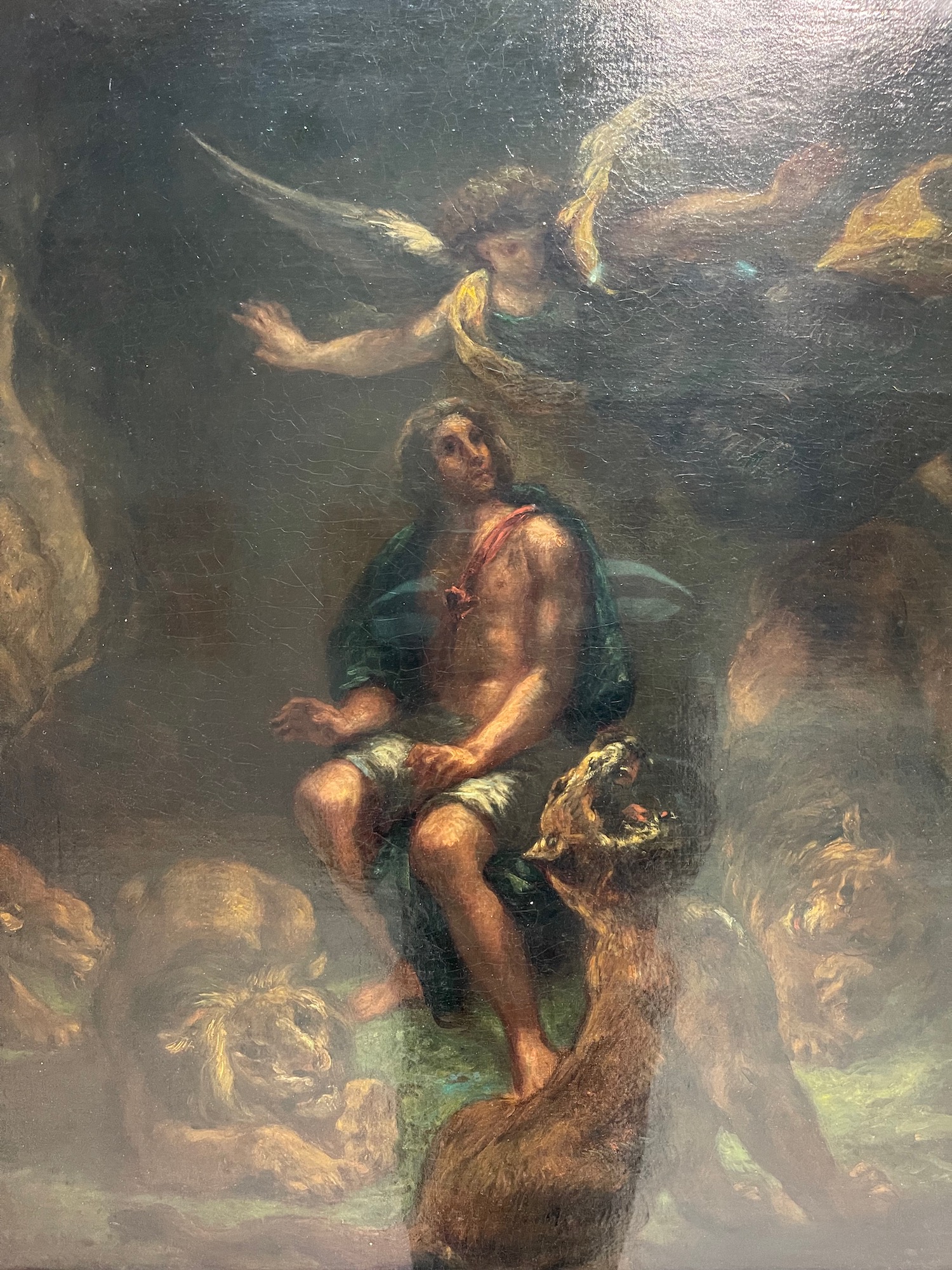 a painting of a man sitting on a snake