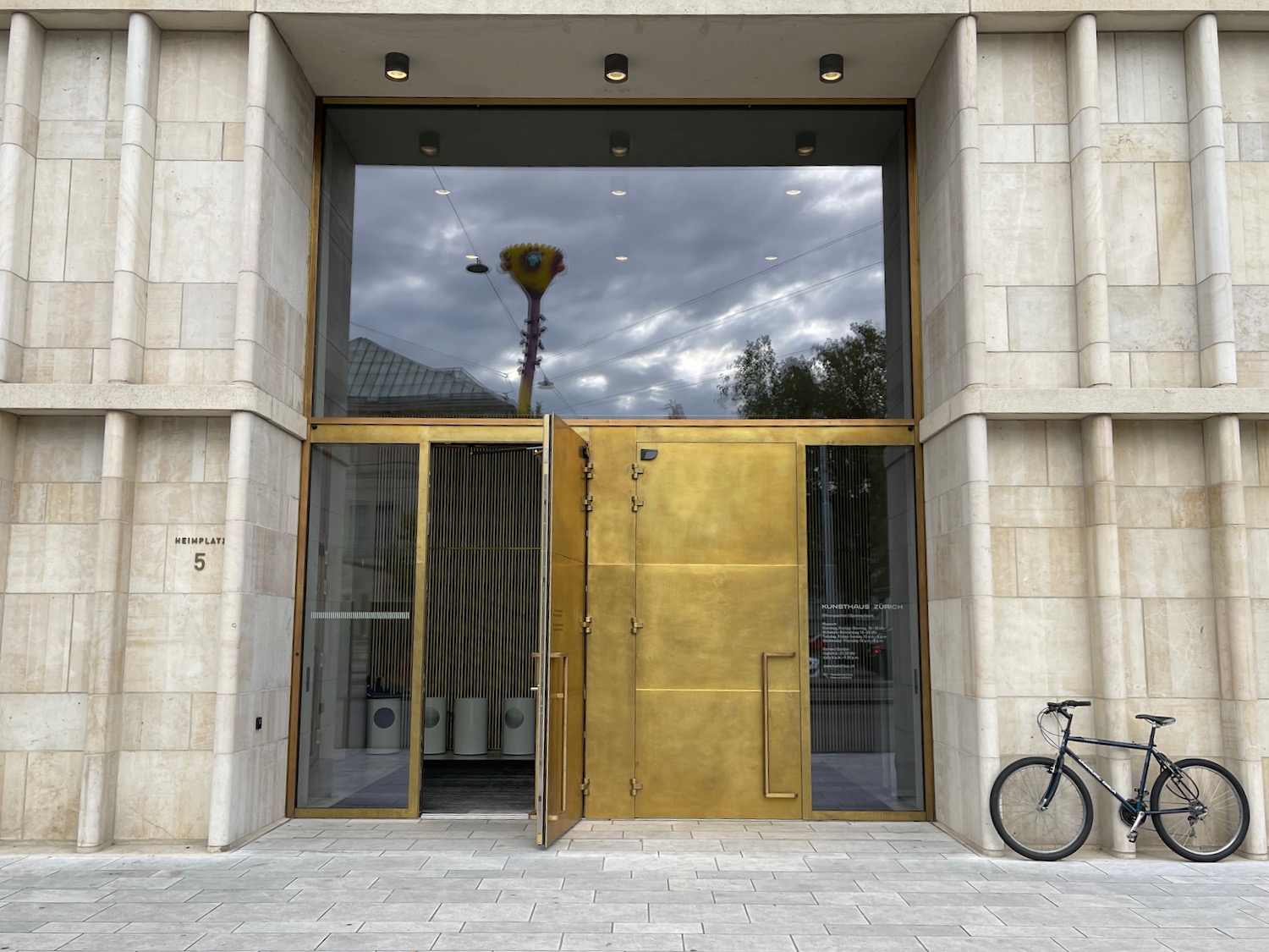 a bicycle parked in front of a building