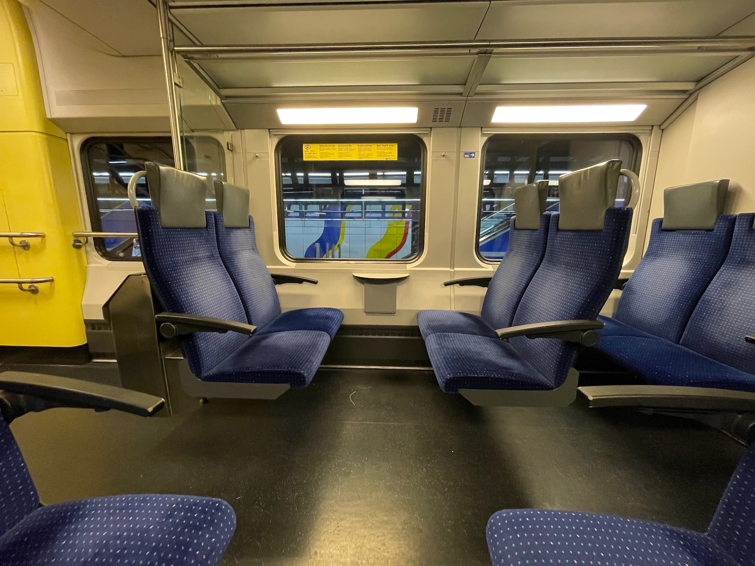 a blue seats in a train