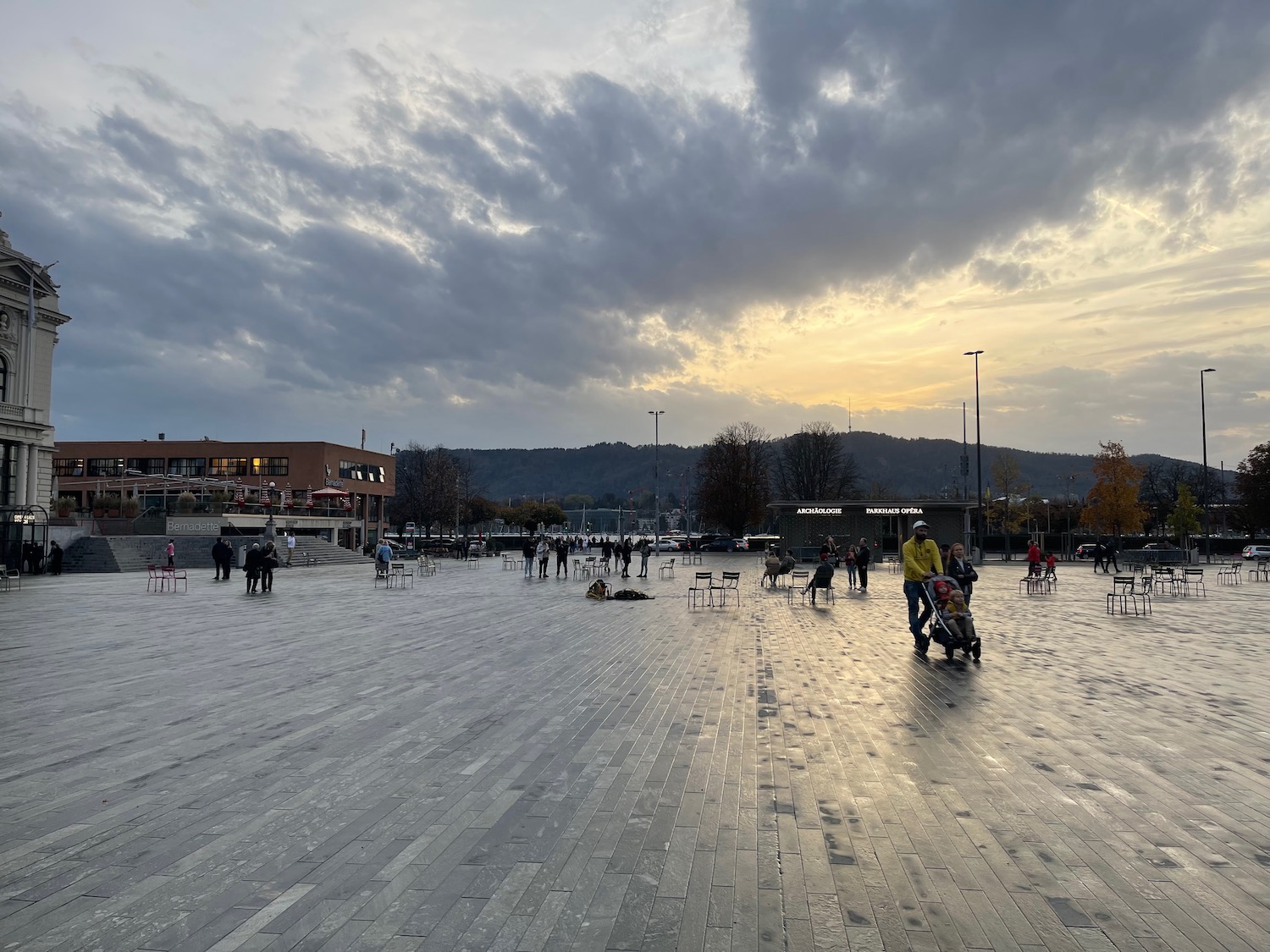 a group of people in a plaza