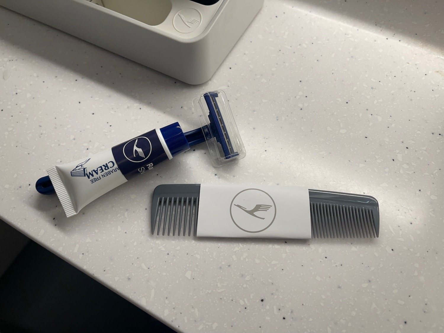 a razor and combs on a counter