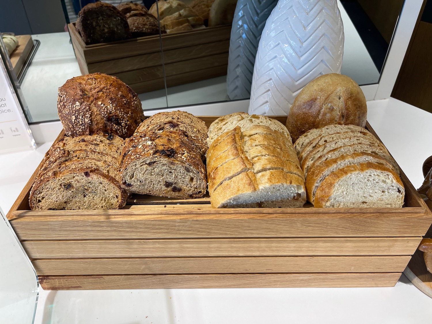 a wooden box of bread