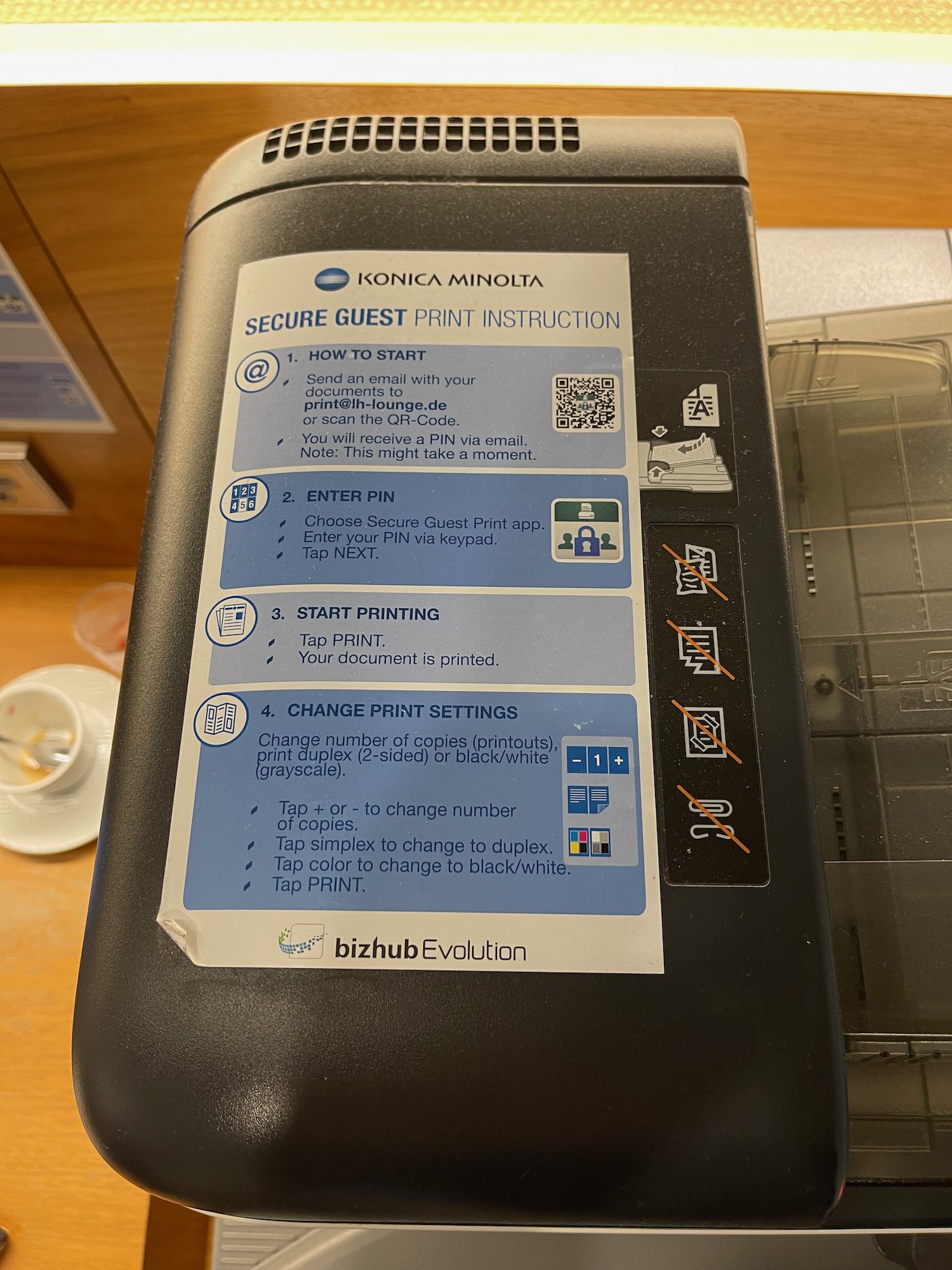 a black printer with instructions
