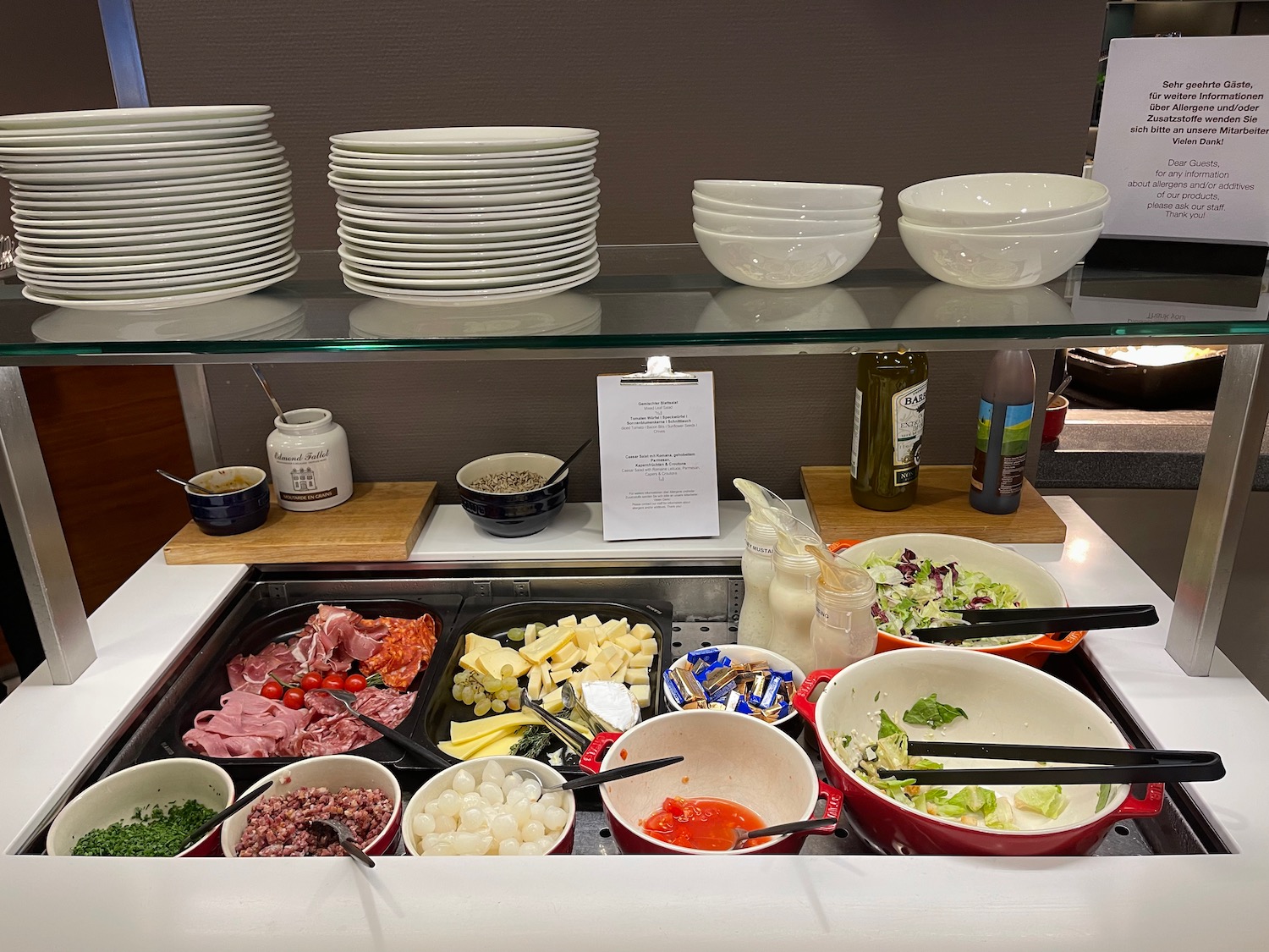 a buffet with plates and bowls