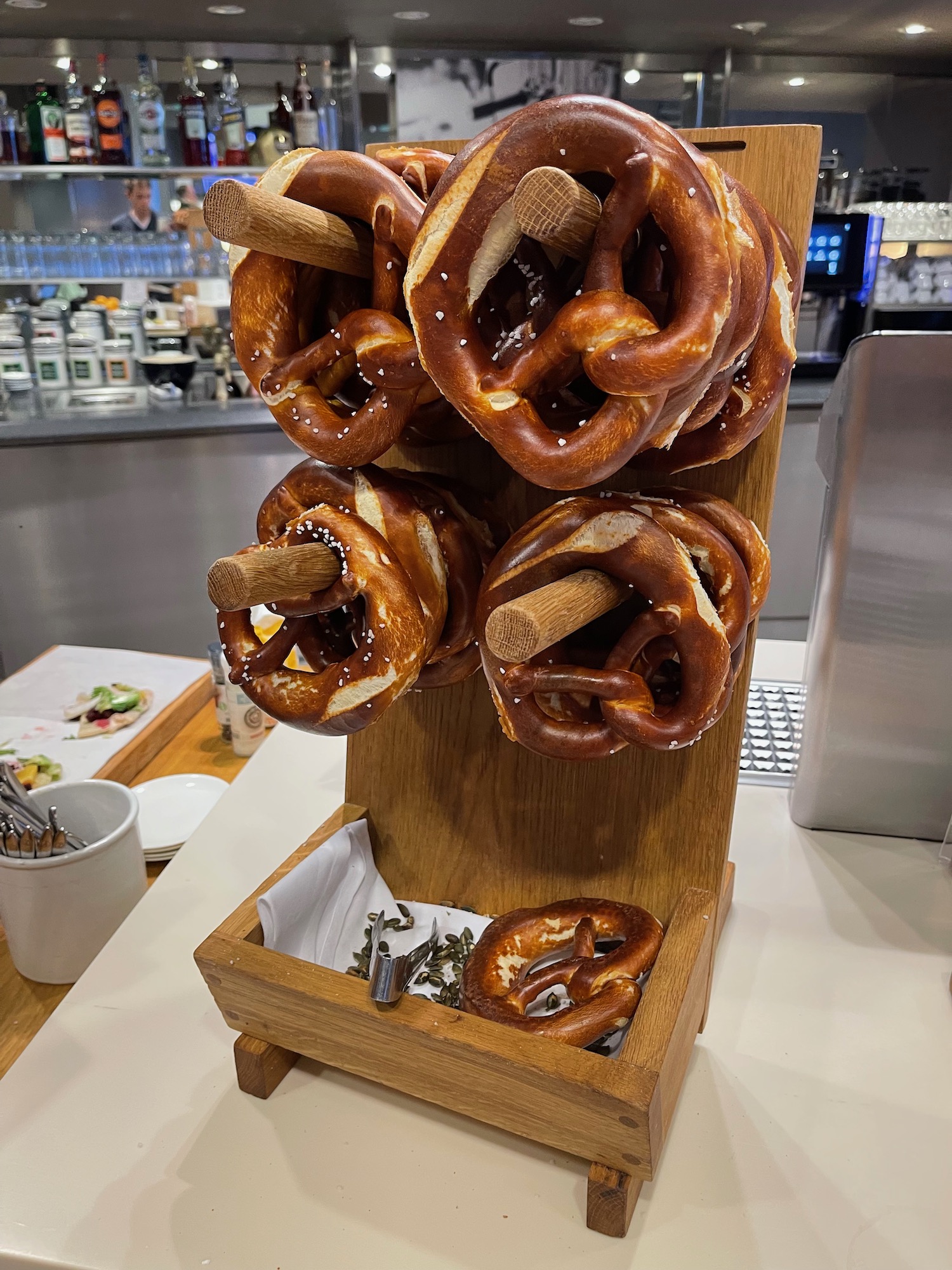 a group of pretzels on a wooden stand