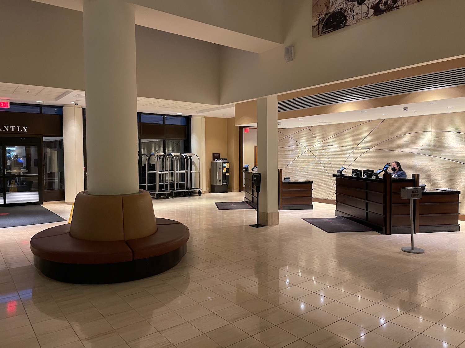 a lobby with a large round counter and a large round chair