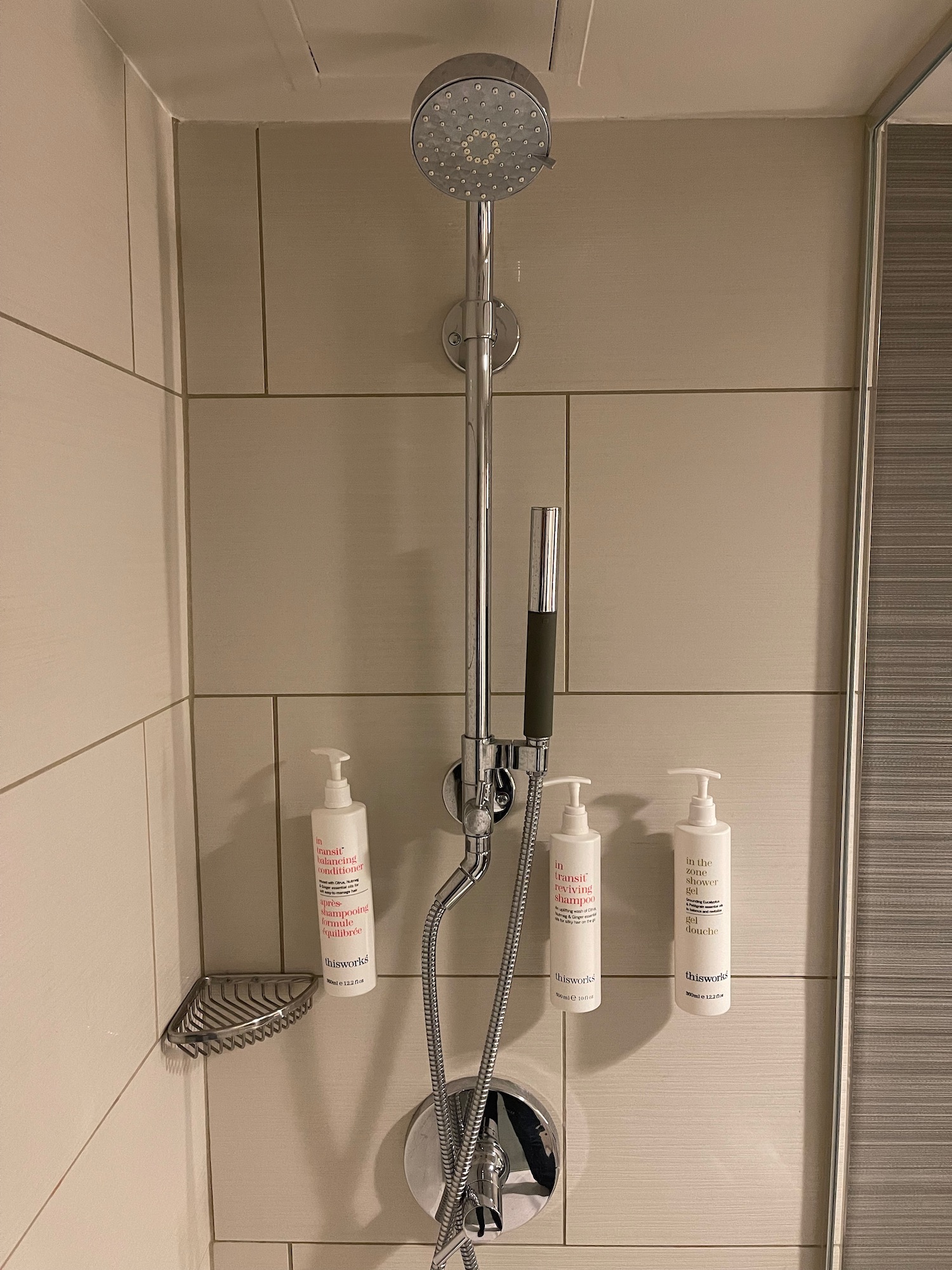 a shower head with a shower head and soaps
