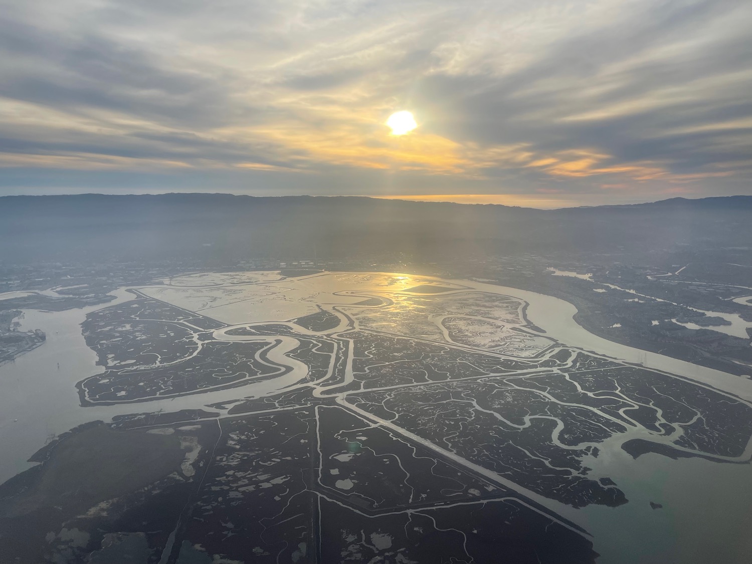 a aerial view of a river and a city