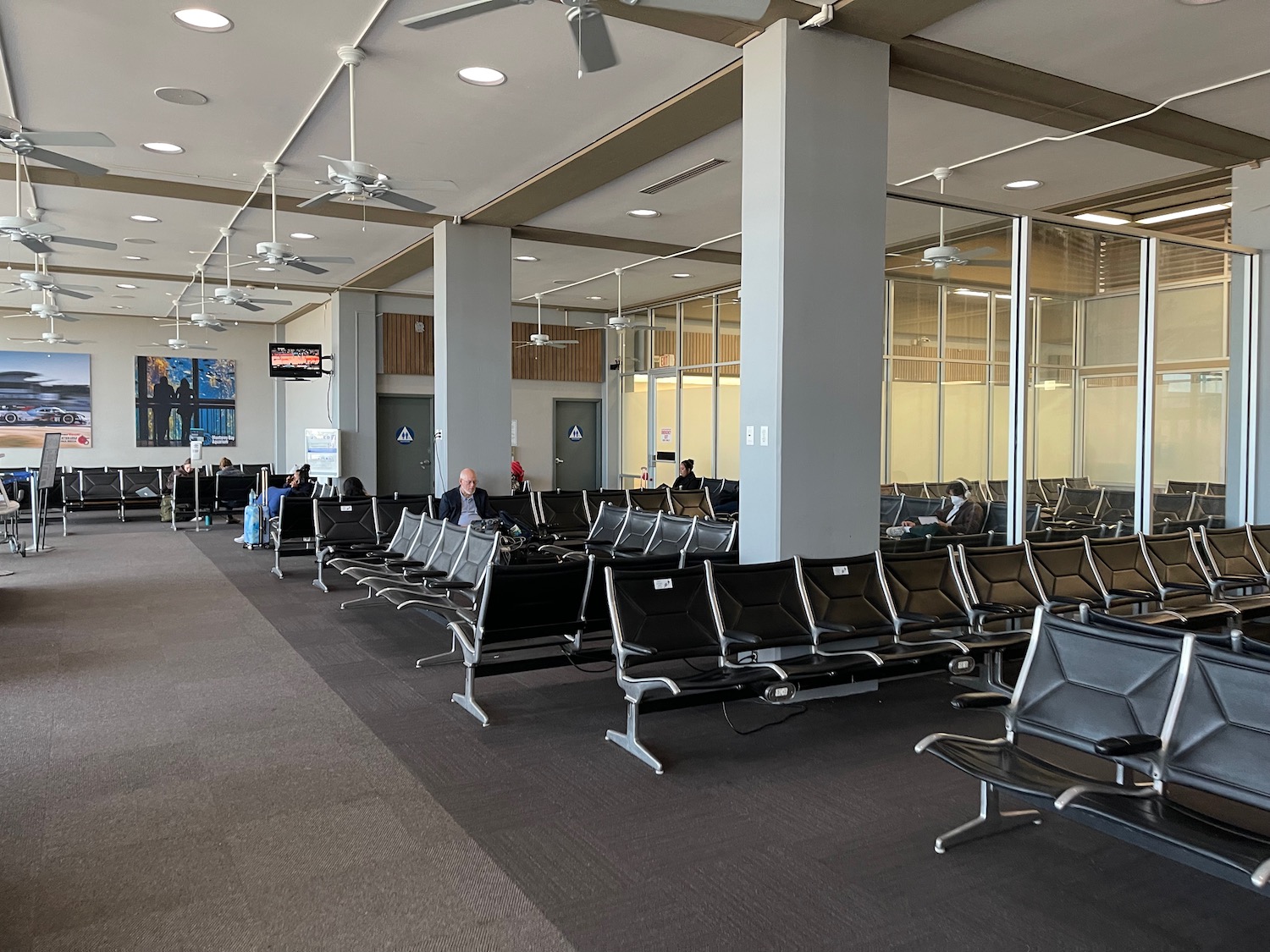 a group of chairs in an airport