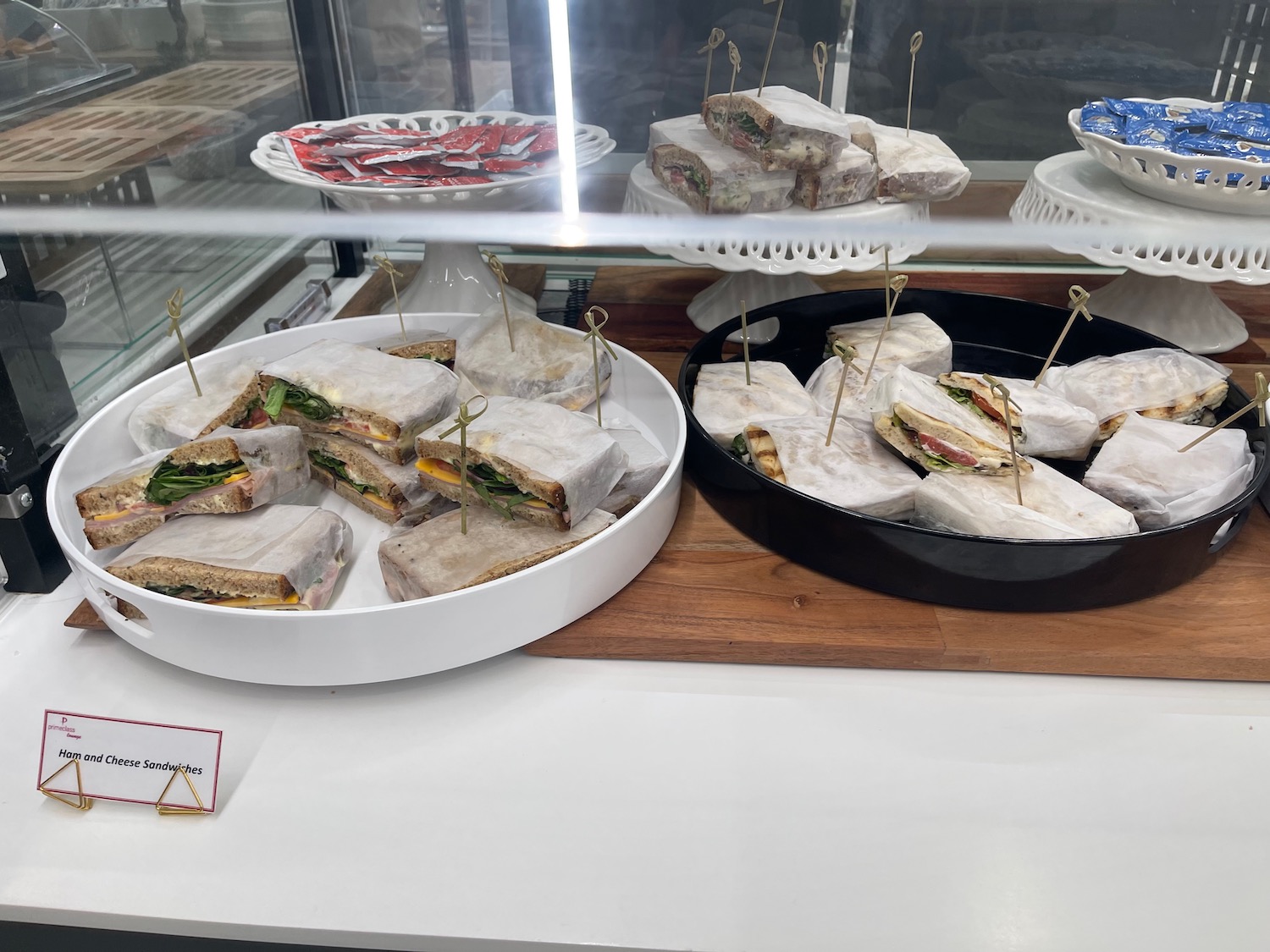 a trays of sandwiches on a table