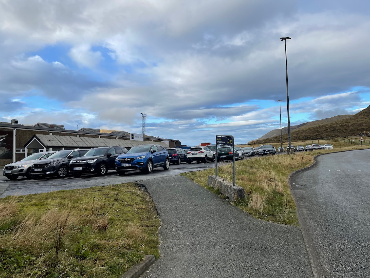 a parking lot with cars parked on it