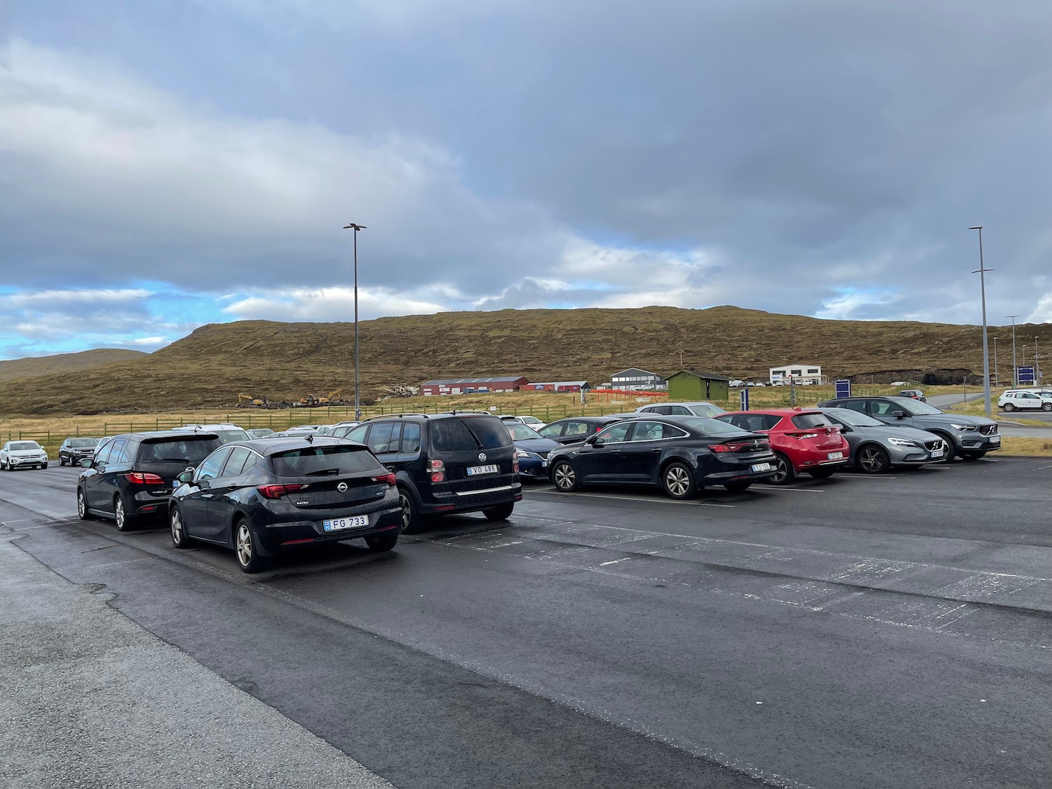 a parking lot with cars parked on it