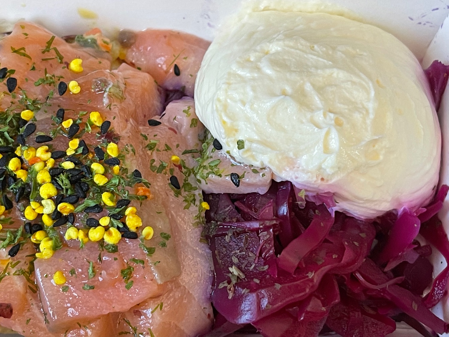 a plate of food with a white object