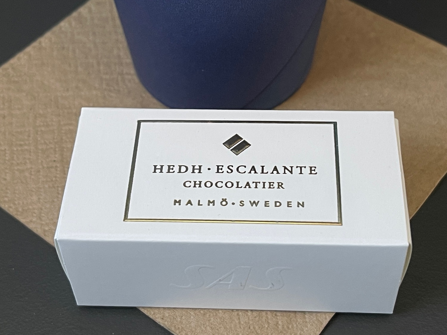 a white box with a logo on it