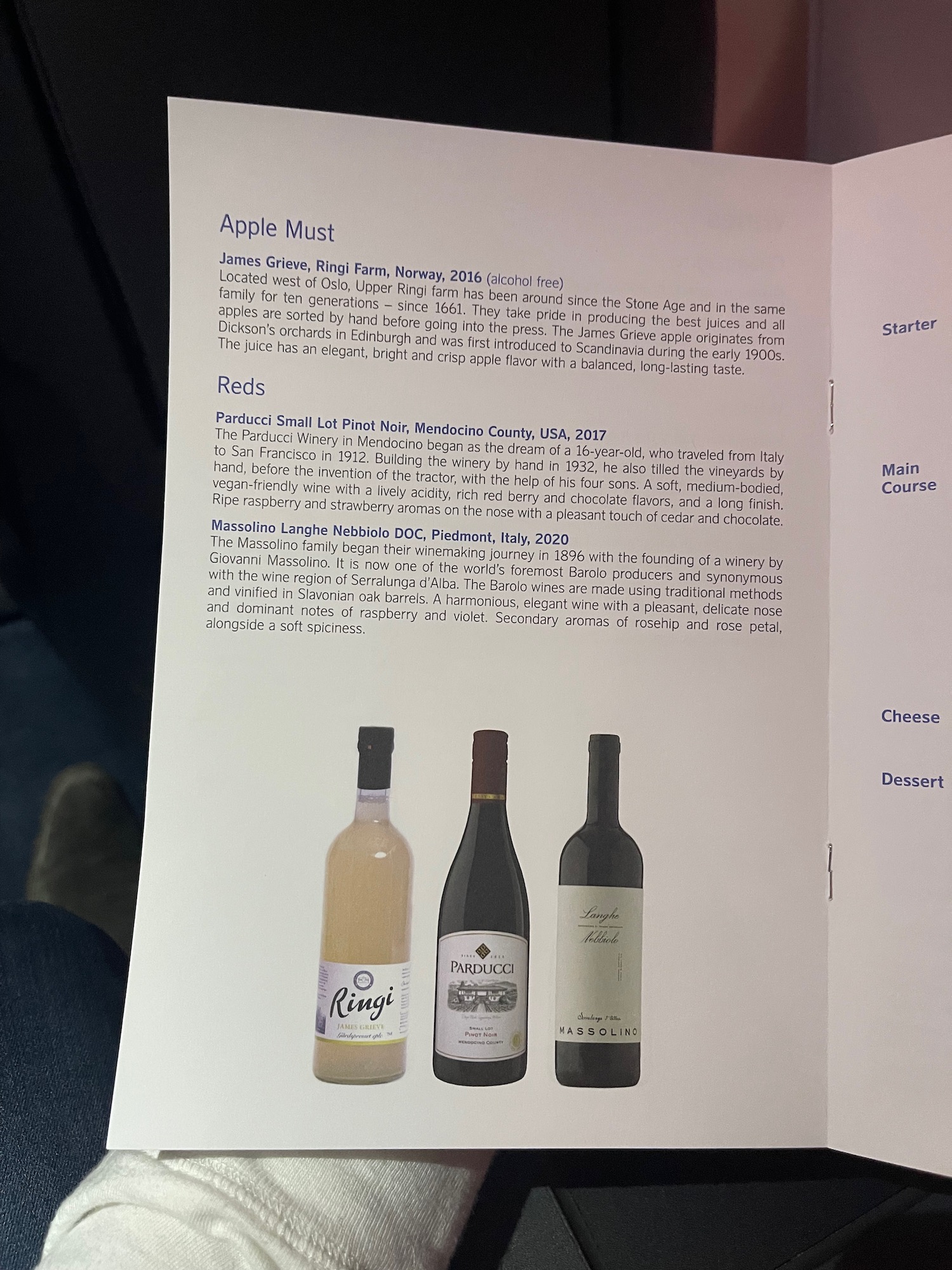 a menu with a picture of wine bottles