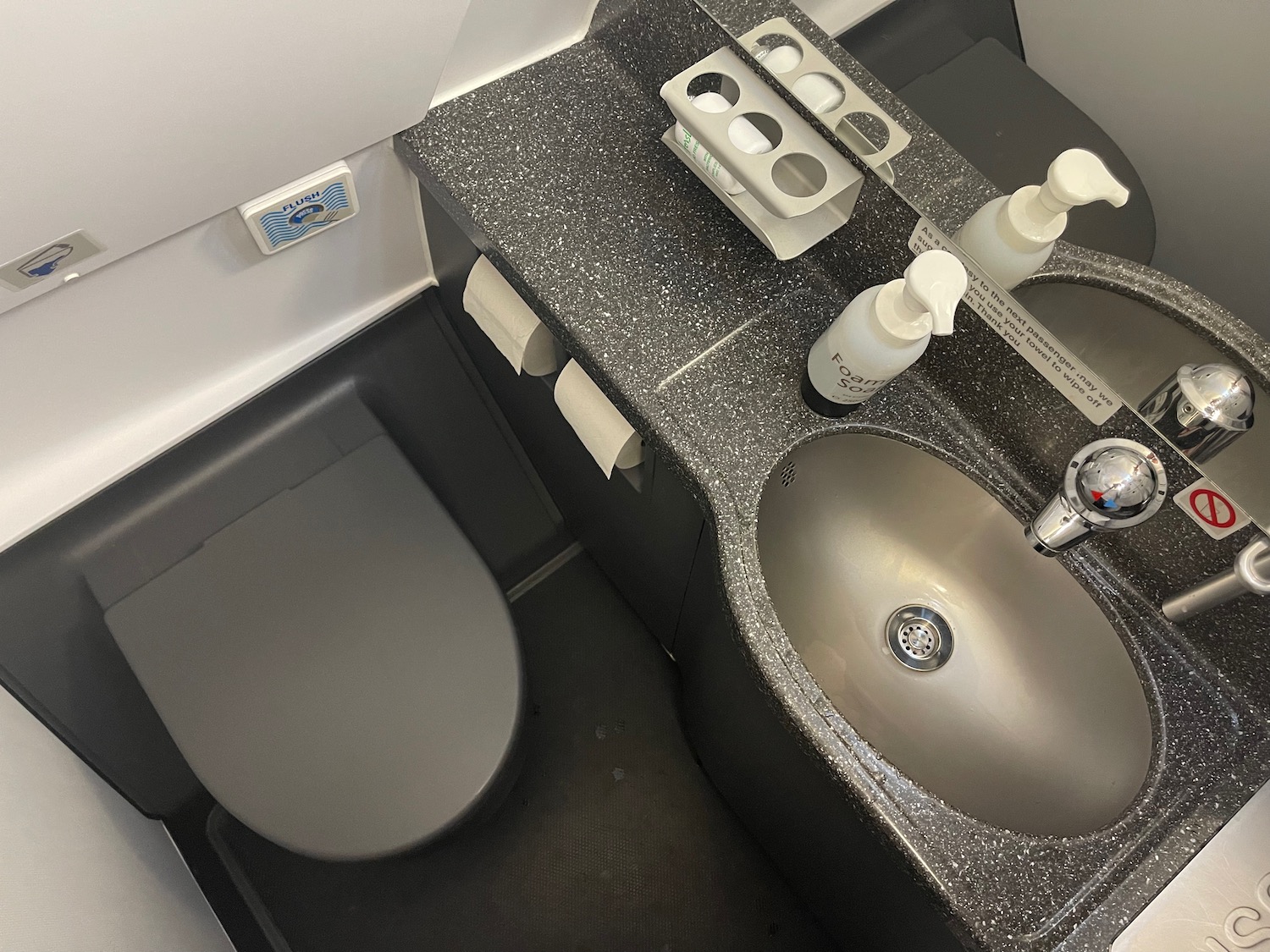 a sink and toilet in a bathroom