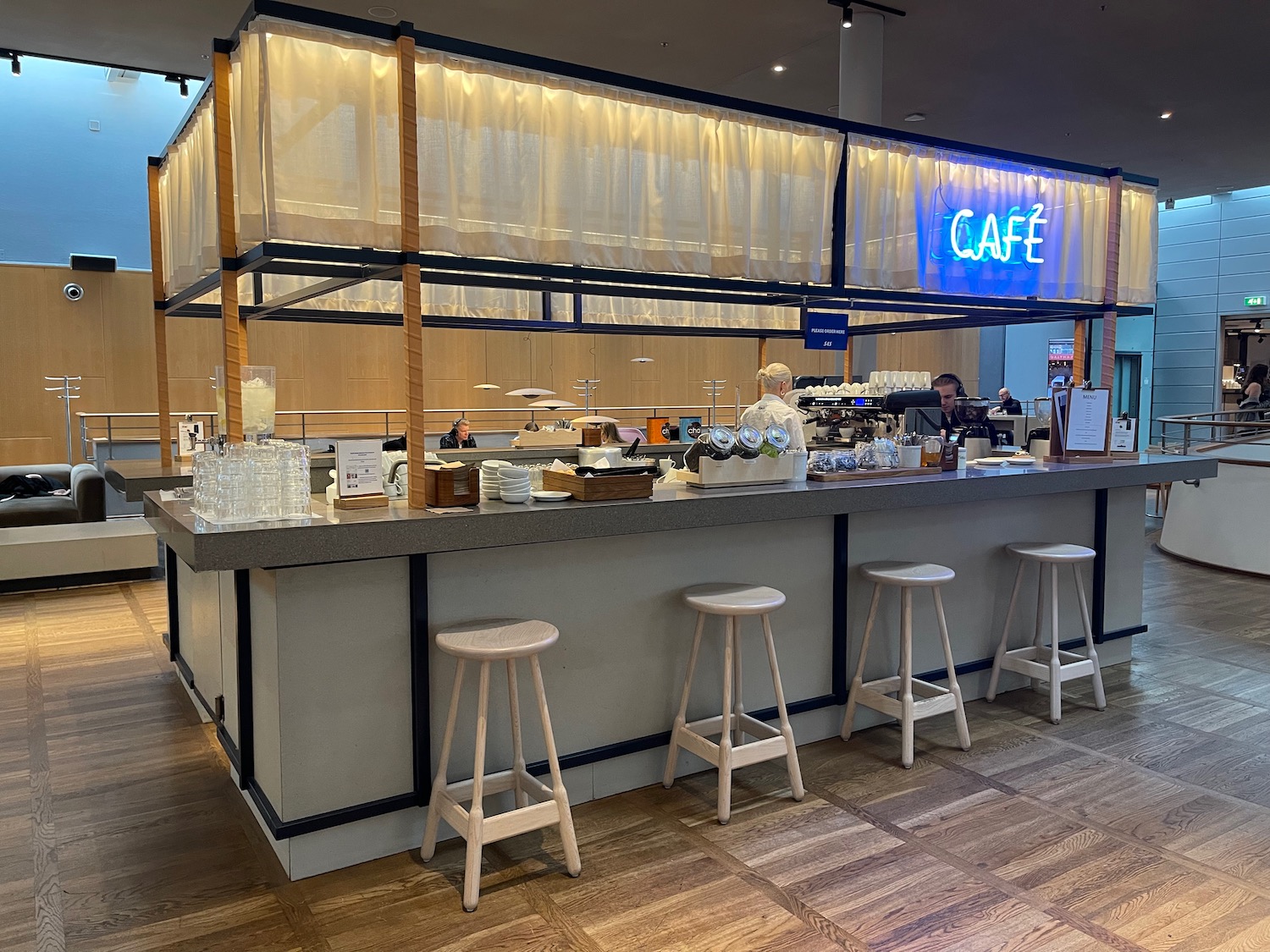 a bar with a counter and stools