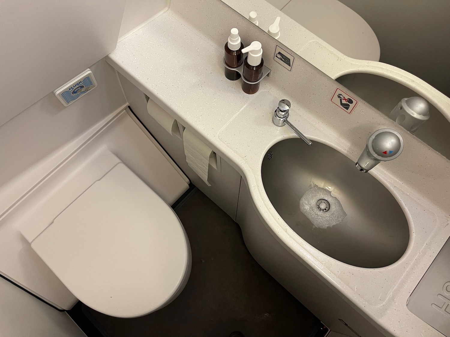 a bathroom with a sink and toilet