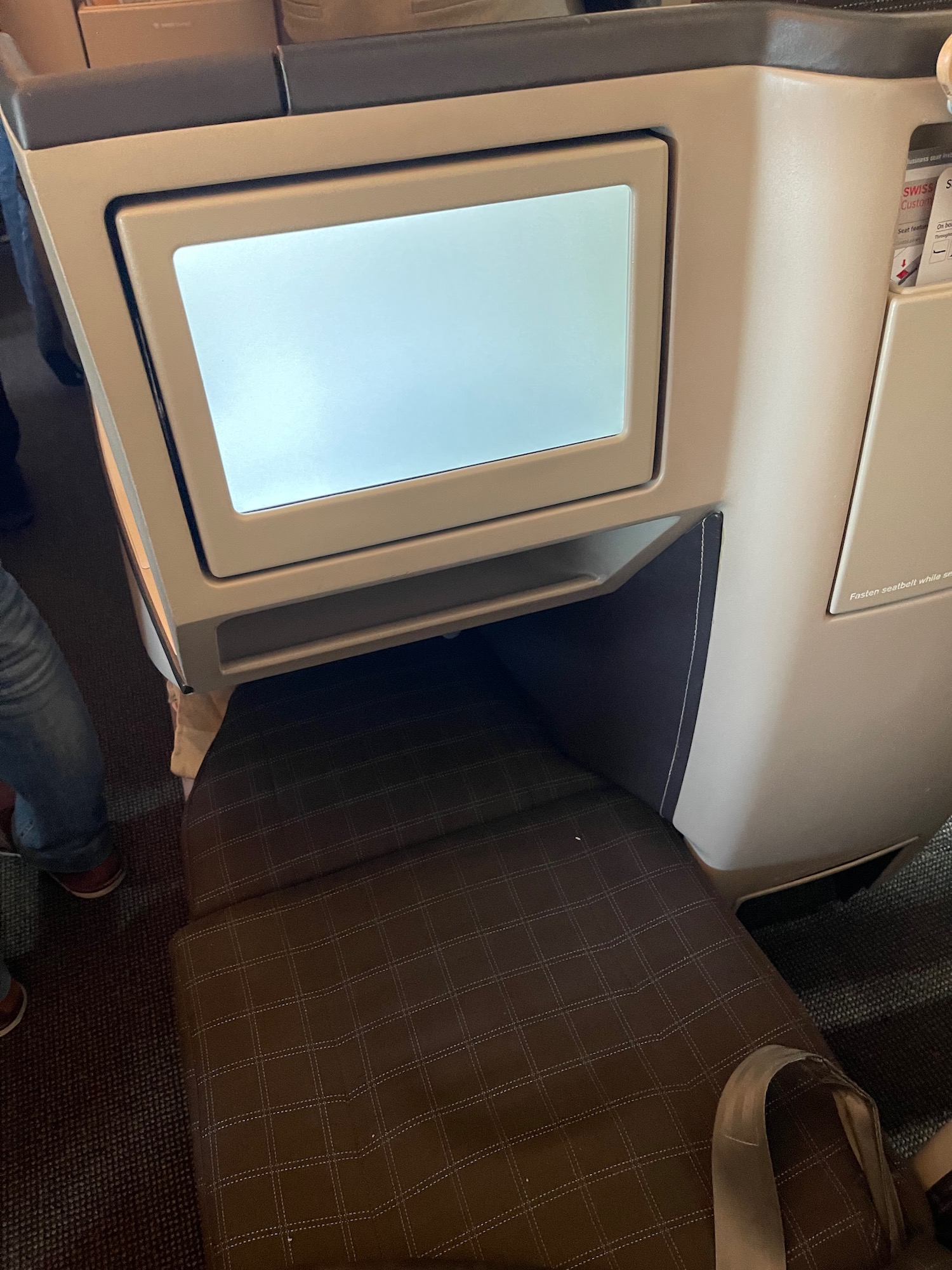 a seat with a screen on it