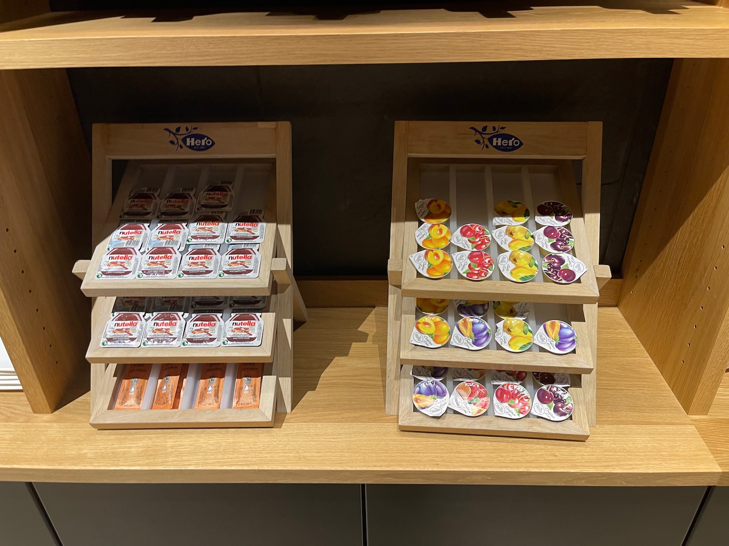 a shelf with a variety of candy on it