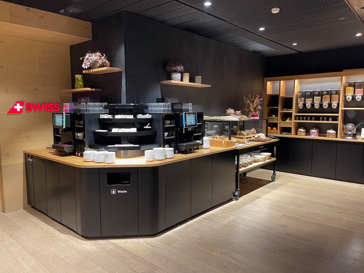 a coffee shop with a counter and shelves