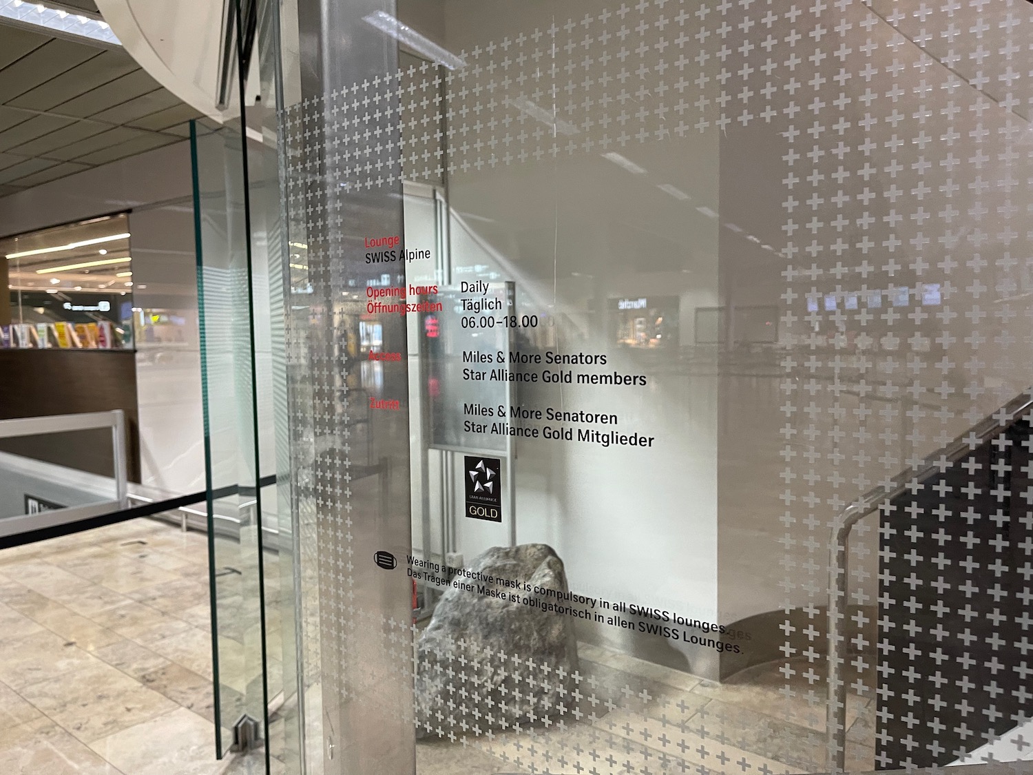 a glass door with a sign on it